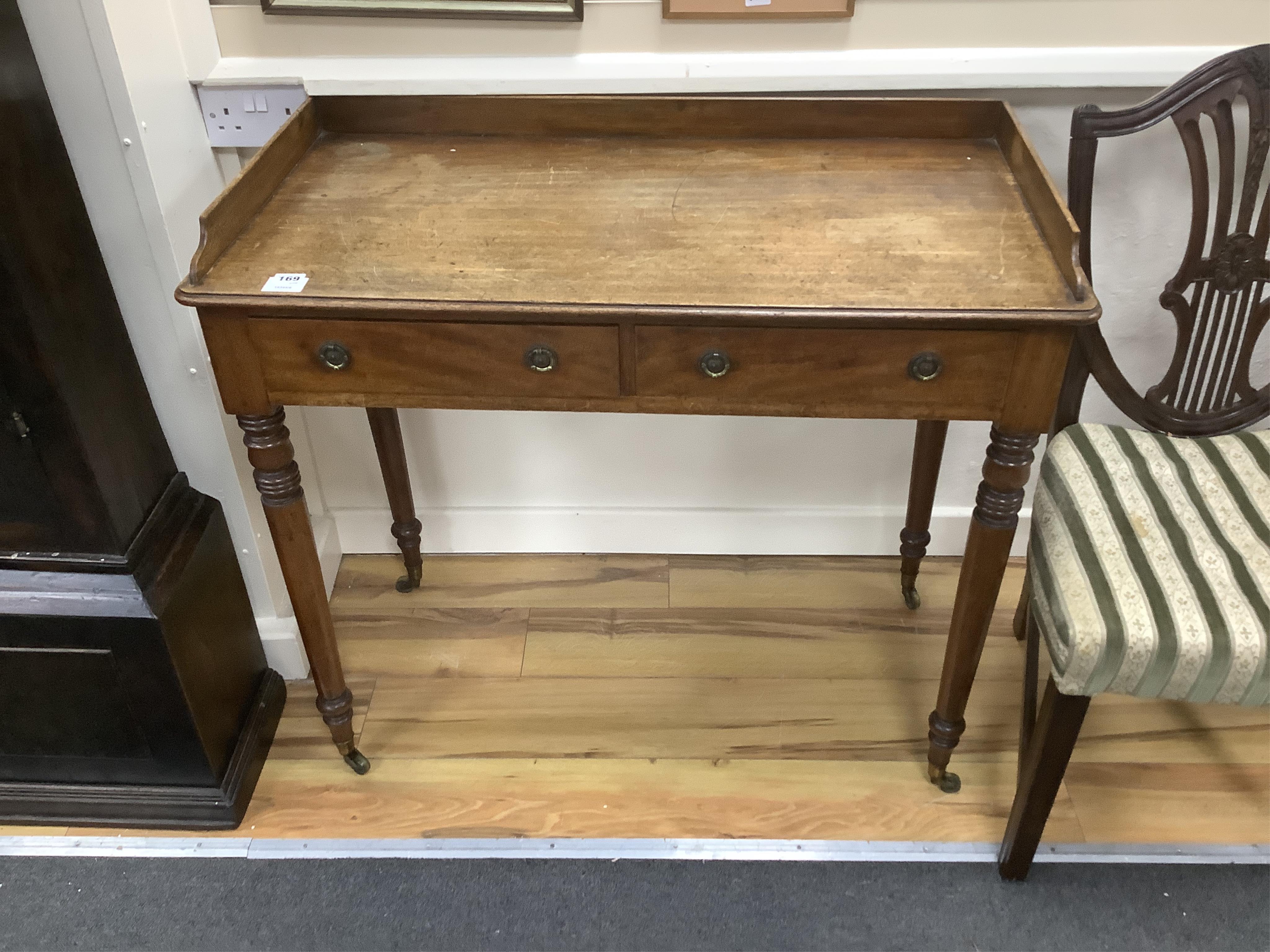 A Regency mahogany washstand, width 93cm, depth 47cm, height 83cm. Condition - fair